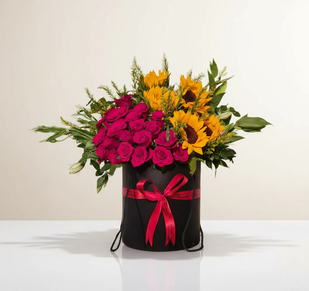 Explore the stunning blend of pink roses and sunflowers, a perfect harmony of passion and joy. Ideal for gifts, events, and special moments.