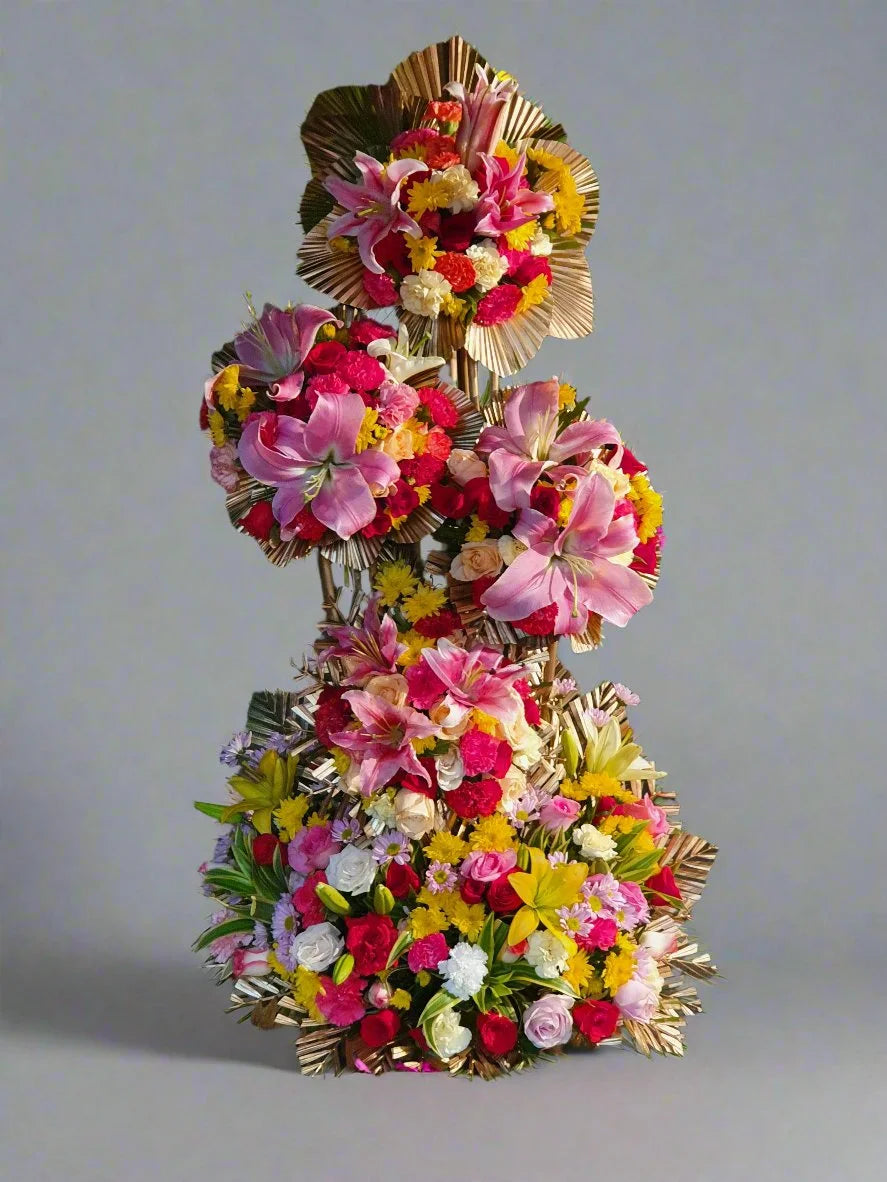 Beautiful mixed flower arrangement featuring roses, carnations, lilies, and seasonal blooms for any occasion. Fresh, vibrant, and elegant floral design.