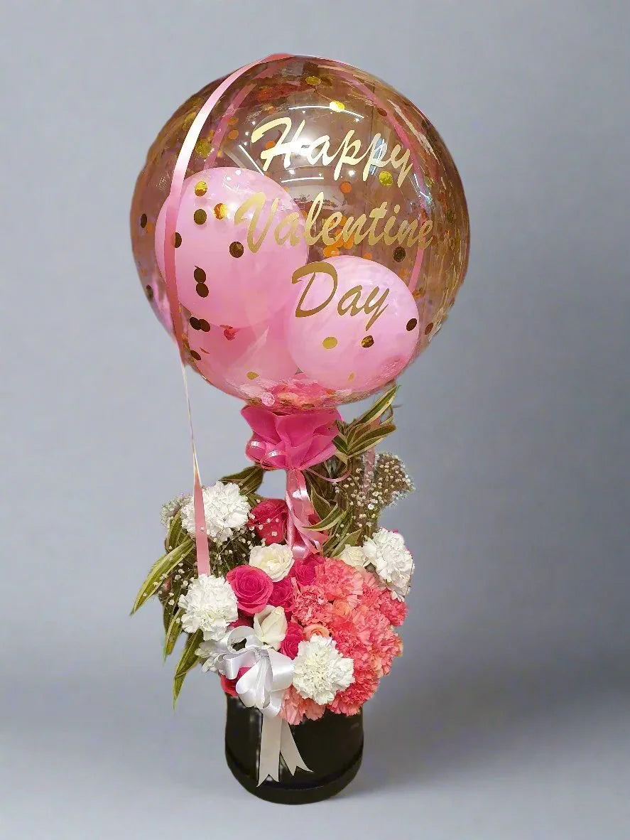Delight your loved ones with a cheerful combo of balloons and fresh flowers. Perfect for making birthdays unforgettable